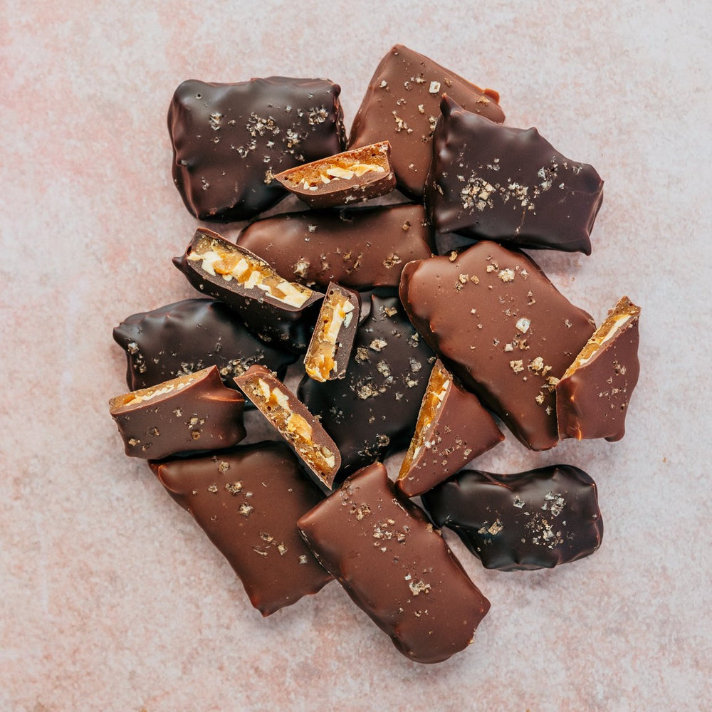 
            
                Load image into Gallery viewer, ALMOND &amp;amp; SMOKED SEA SALT BUTTERCRUNCH TOFFEE 140g (choose milk or dark)
            
        